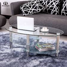 Should always look refreshing, unique and elegant, as that is where you would sit for a fresh cup of coffee and feel rejuvenated. Clear Glass Oval Side Coffee Table Shelf Chrome Base Living Room Furniture Zety Coffee Table With Shelf Coffee Table Living Room Coffee Table