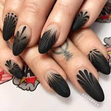 This edgy manicure screams, do not even try to mess with me! and a matte finish is achieved quite easily: 50 Dramatic Black Acrylic Nail Designs To Keep Your Style On Point