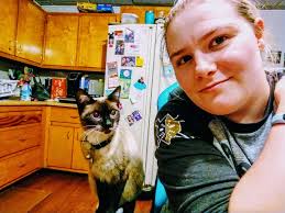 Cleo's sister Snowflake is a Siamese Lynx