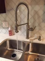 The countertop has a white undermount ceramic sink in an oval shape (faucet is sold. Pin By Patrice Gadpaille On Kitchen In 2021 Kitchen Faucet Pull Out Kitchen Faucet Shower Faucet
