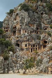 Tombs Carved Into The Side Of A Cliff Overlooking The Ruins Of The Ancient City Of Myra Turkey World Most Beautiful Place Ancient Cities Ancient Ruins