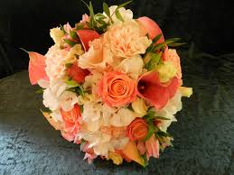 Say hello to our custom wedding floral package. Sandra S Flower Studio Coral And Ivory Wedding Flowers