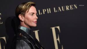 A short bowl cut with an undercut and sandy blonde highlights. Charlize Theron S Slicked Back Short Hair Charlize Theron S Bowl Cut Instyle