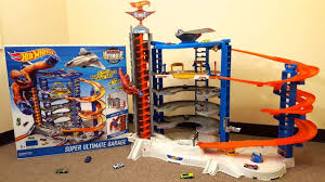 Hot Wheels Super Ultimate Garage Motorized Mega City Playset With Jet Plane Spiral Speedway Gorilla You Hot Wheels Ultimate Garage Ultimate Garage Hot Wheels