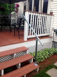 We have a raised deck behind the house with a set of concrete steps down to a patio. 45 Porch Railing Ideas You Can Build Yourself Simplified Building