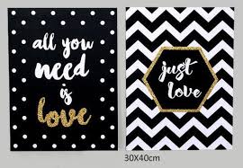 Il sera un élément décoratif original dans un intérieur moderne et contemporain. Toiles Wild Motifs Geometriques Noir Blanc Or Deco Murale Chic Moderne