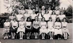 found this photo and thought it may be of interest. Mrs Isaac with class 4B 