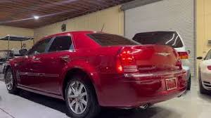 Image result for Deep Coral Red 2008 Chrysler