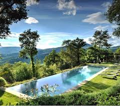 The Perfect Place To Spend A Leisurely Sunday Afternoon Beside The Pool Of The Villa Arrighi On The Magnifice Hotel Swimming Pool Italian Villa Swimming Pools