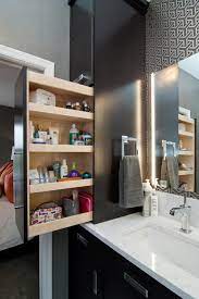 For storing towels, toilet paper and other bathroom items, consider installing a shelf, a cabinet or stacking baskets over the toilet to hold these items. Small Space Bathroom Storage Ideas Diy Network Blog Made Remade Diy
