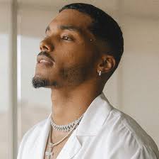 Rome Flynn Keeps It Fly in a Fashion Nova White Button Shirt