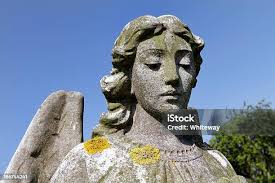 Beautiful Stone Angel With Caring Regard Stock Photo