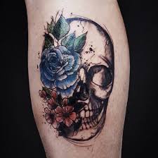 Colorful flower skull tattoo on left upper thigh. 35 Flower Skull Tattoos Feminine Skull Tattoos For Girls