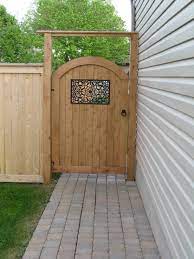 Arched Otty Style Pre Made Gate With Nuvo Iron Gate Insert Snug Cottage Hardware And Gate Brace Supplied By La Backyard Gates Wooden Fence Gate Garden Gates