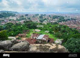 Aerial view of the city of Abeokuta, Ogun state (south-west), Nigeria, and  its houses with rusty rooftops, taken from Olumo rock Stock Photo - Alamy