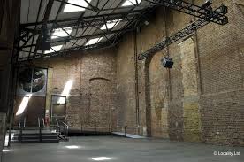 Event Space Concrete Floor Warehouse Skylights Textured Wall Brick Brick Walls As A Feat Concrete Interiors Concrete Floors Converted Warehouse Apartment