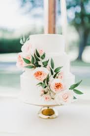 White Buttercream Wedding Cake With Cascading Fresh Flowers Wedding Cake Fresh Flowers Simple Wedding Cake Wedding Cake Toppers