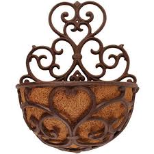 I am on the last day of my big book tour and while i am so tired, i'm really looking forward to and speaking of outdoors, a few of my new indoor/outdoor rugs are available now to buy! Half Round Classic Wall Planter Iron Accents