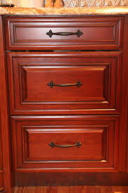 Birch cabinet doors stained with a rich mocha color look best with hardware in silver, bronze, or glass. 15 Hardware For Cherry Cabinets Ideas Cherry Cabinets Cherry Cabinets Kitchen Kitchen Remodel