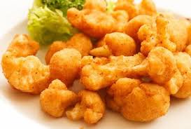 Cavolo marrone in pastella su tutti i lati e posto su un tovagliolo. Cavolfiore Fritto Agli Agrumi Gonews It