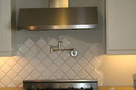 Beveled arabesque tile, whisper white kitchen backsplash & shower tiles. Pic Heavy Beveled Arabesque Is Being Install As I Type