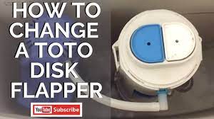 Gently slide the arms of the flapper off the plastic pegs on the flush valve assembly. How To Change A Toto Disk Flapper Youtube