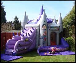 Dragon Themed Bouncy Castle And It S Purple Bouncy Castle Bouncy Castle Hire Bouncy