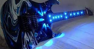 Blue Swirl Guitar With Led Lights Embedded Into The Neck And By The Pick Up I Could Dig It In The Light Or The Da Cool Electric Guitars Guitar Custom Guitars