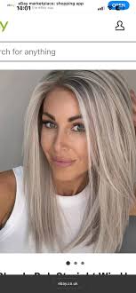 Hi, is there any blonde specialist, who can get my long black box hair dye  to something like the blonde pic without losing much length? Preferably  mobile, if not that's fine.