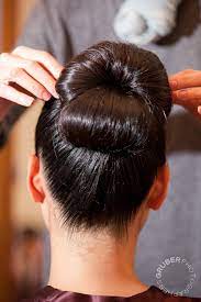 101 Hairstyles That Will Steal The Show This Prom Season Bun Hairstyles Glossy Hair Prom Hair