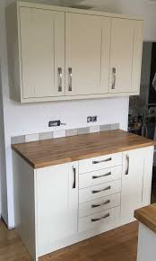 Combination grey and oak shaker kitchen. Ivory Painted Ash Shaker Kitchen Oak Worktops Precision Kitchens