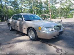 Image result for Medium Gold 1998 Town Car