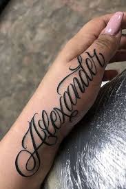 25 Awesome Hand Tattoo Designs Name Tattoo On Hand Hand Tattoos Tattoo Lettering Styles