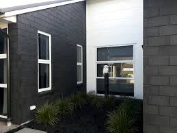 However, natural brick also looks stunning with the right paint choices on trim, siding, and soffits. Black Painted Brick Exterior Novocom Top