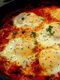 Eggs Poached In Spicy Tomato Sauce Or Shakshouka Recipe Shakshuka Recipes Spicy Tomato Sauce