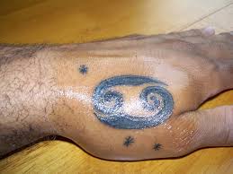 This a lovely tribal design with the 69 symbol representing the cancer and their dreamy nature that always keeps them occupied in imaginations. Cancer Sign Tattoos 25 Graceful Collection Design Press
