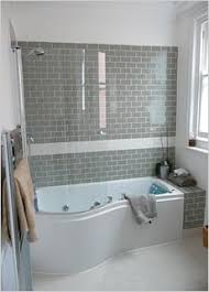 Wall showerheads grey stone wall shower partitions the concept of small bathroom design arched modern faucet‚ glass. 27 Glass Tiles Bathroom Ideas Glass Tile Bathroom Tile Bathroom Akdo