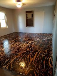 Plywood Sheet Flooring Bob Schoenfelder Burned Plywood Floor Featured On Remodelaholic Burnt Plywood Floor Diy Flooring Plywood Floor