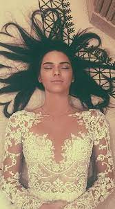 Who Made Kendall Jenners White Lace Long Sleeve Gown Kendall Jenner Heart Hair Kendall Jenner Photos Kendall Jenner Instagram