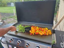 These griddles are made from 7 gauge steel and are thicker than the 28, 22 and 17 inch griddles for better heat retention. Blackstone 4 Burner 36 Griddle With Air Fryer And Hood Walmart Com Walmart Com