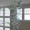 This blown glass novelty chandelier is a product of skilled maestros. 1