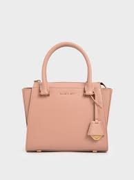 Find everything from crossbodies, purses, handbags, totes and travel options. Blush Structured Trapeze Bag Charles Keith Lu