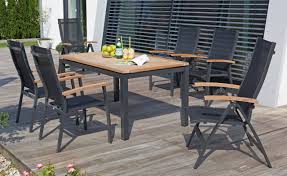 Im materialmix werden die verarbeiteten stoffe. Wetterfeste Terrassen Sitzgruppe Mit Robustem Outdoor Tisch Stapelbarer Gartensessel