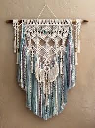 Add beads to your macrame wall decor to give this simple macrame design a lovely contrast to your bare wall. 72 Macrame Wedding Ideas For A Boho Bride Macrame Macrame Wedding Boho Wedding