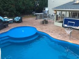 The Clearwater Beach Provides A Wide Swimming Pool Basin Large Enough For 3 4 Bathers To Comfortably Float And Relax Togeth Beach Entry Pool Backyard Pool Pool