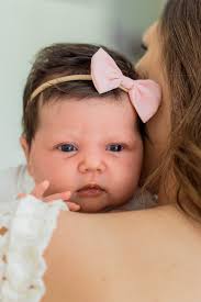 It's more fun with four! We welcomed Rose Elizabeth to our family in  mid-June. She's got the most kissable cheeks and has been the perfect  addition. I'm still in awe of the