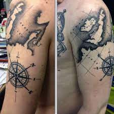 This tattoo is more aligned on the shoulder but geographic tattoos look better on just the back. 50 World Map Tattoo Designs For Men Adventure The Globe