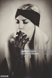 875 Smoking Woman Female Alone Vintage Stock Photos, High-Res Pictures, and  Images