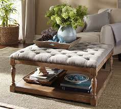 Two rows of nailheads along the piped edges accentuate its handsome silhouette. Cassandra Upholstered Storage Ottoman Fabric Coffee Table Upholstered Ottoman Coffee Table Ottoman Coffee Table