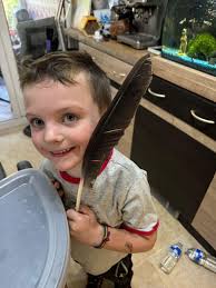 Heart-shaped feather found floating